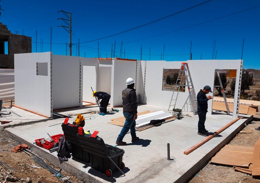 Day 3-6: After the slab is constructed, walls are built by pouring concrete.