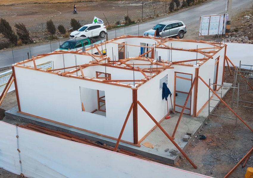 Day 3-6: After the slab is constructed, walls are built by pouring concrete.