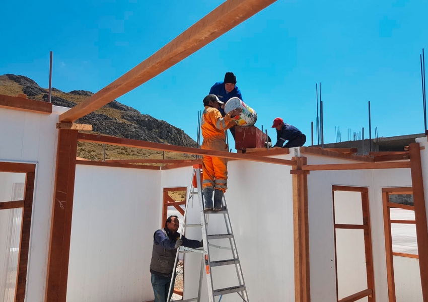 Day 3-6: After the slab is constructed, walls are built by pouring concrete.